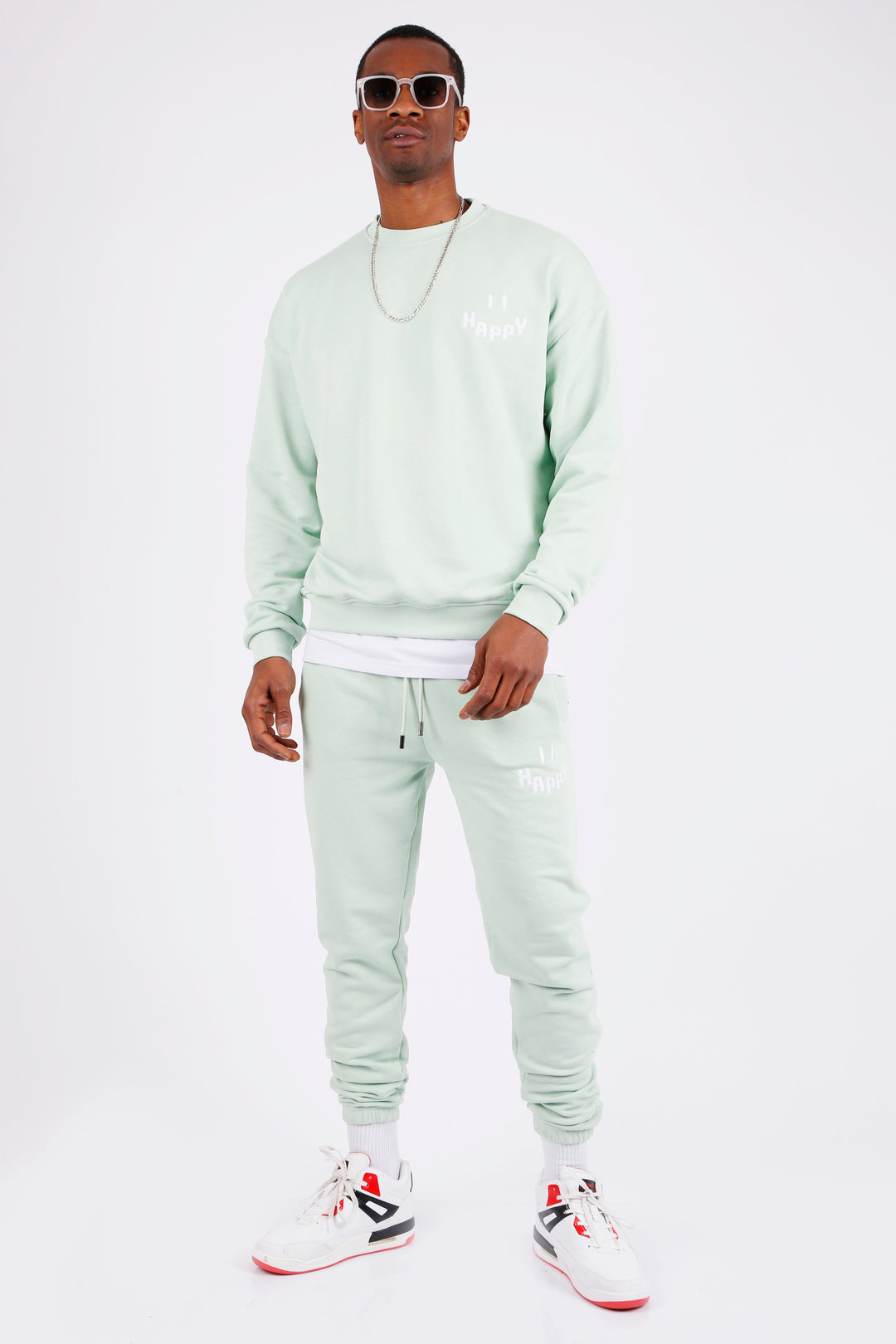 MEN'S OVERSIZE FIT TRACKSUIT WITH PRINTED SMILEY FACE DESIGN